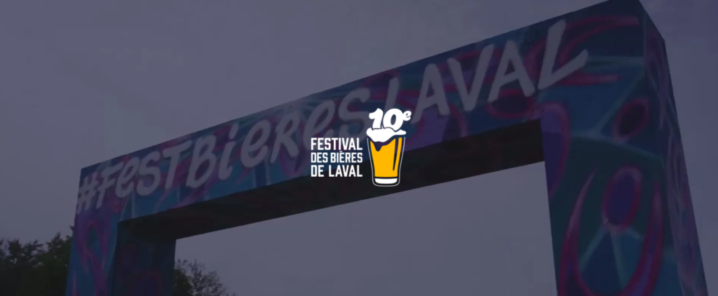 Archway banner announcing the 10th Festival des Bières de Laval, with a beer glass logo in the center.