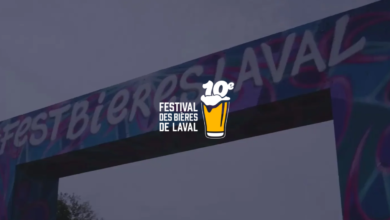 Archway banner announcing the 10th Festival des Bières de Laval, with a beer glass logo in the center.