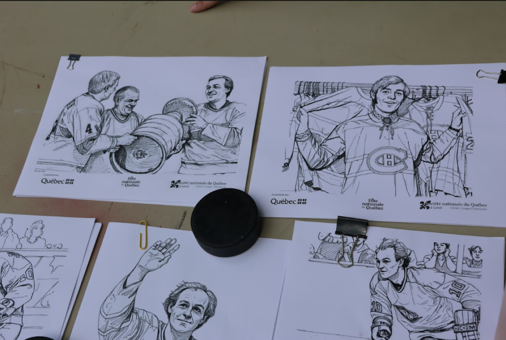 Four black-and-white hockey sketches pinned to a beige table with binder clips, a round black puck container centered among them, and Quebec logos visible.